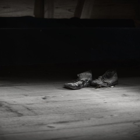 a pair of shoes sitting on the floor