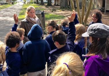 a group of people standing in front of a crowd