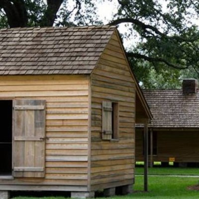 a house with trees in the background