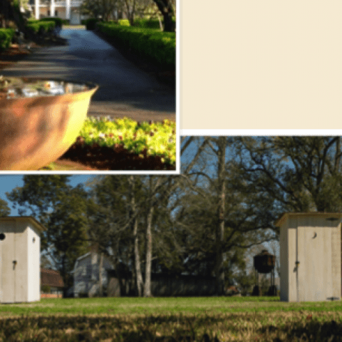 a sign in front of a house
