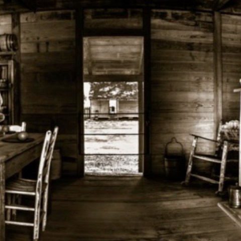a room filled with furniture and a fire place