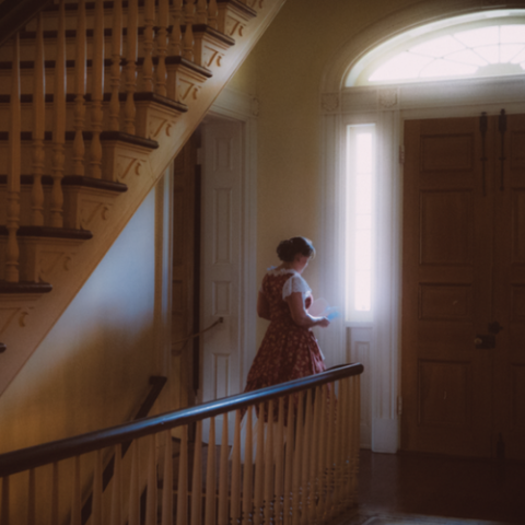 a man standing in front of a building